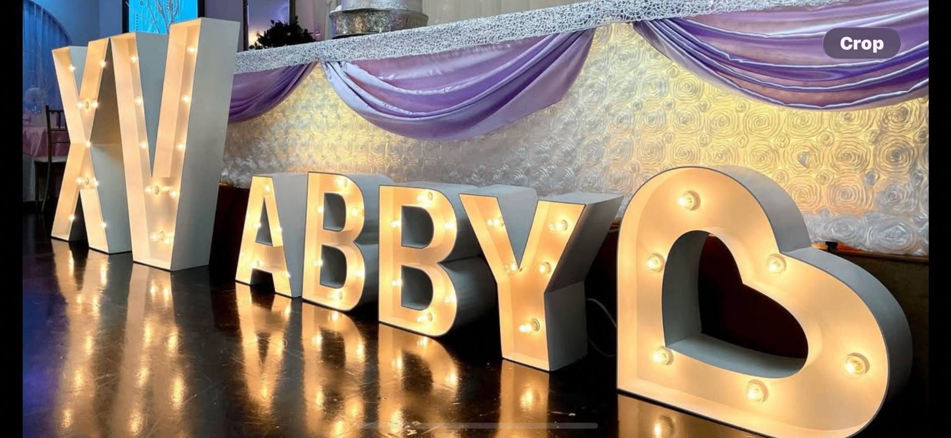 Illuminated marquee letters at a luxury event